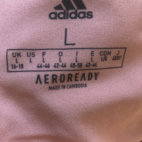 Peach size L brand new workout shirt. Did not use, it did not fit me. - Picture 2 of 3